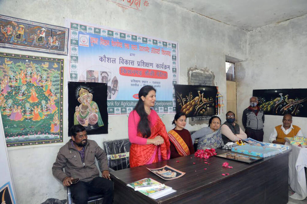 NABARD Kishangarh-style painting training programme banner and group photo, Ralawata