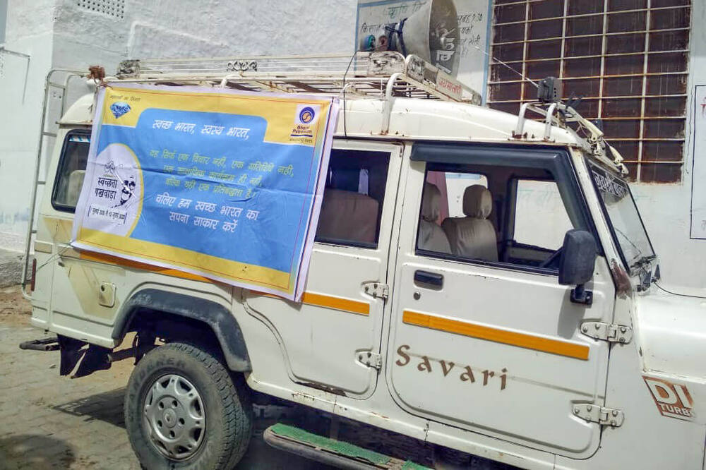 Campaign vehicle with a BPCL Swachhata Pakhwada banner, Ralawata