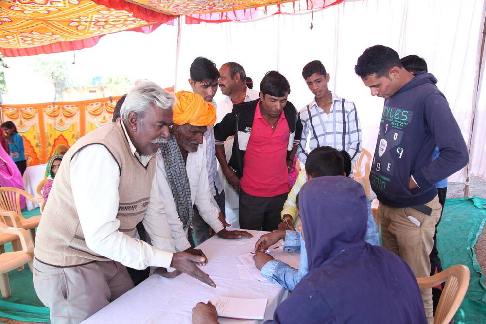 Villagers registering at an NSIC camp, December 2017