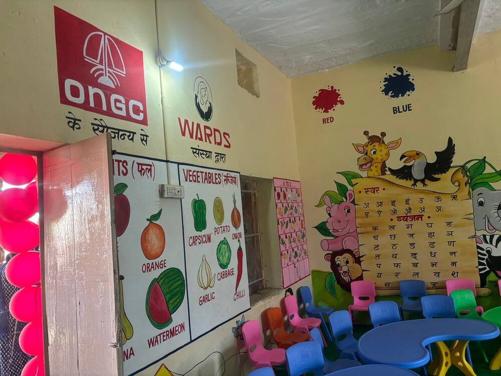 ONGC and WARDS branding on renovated classroom wall