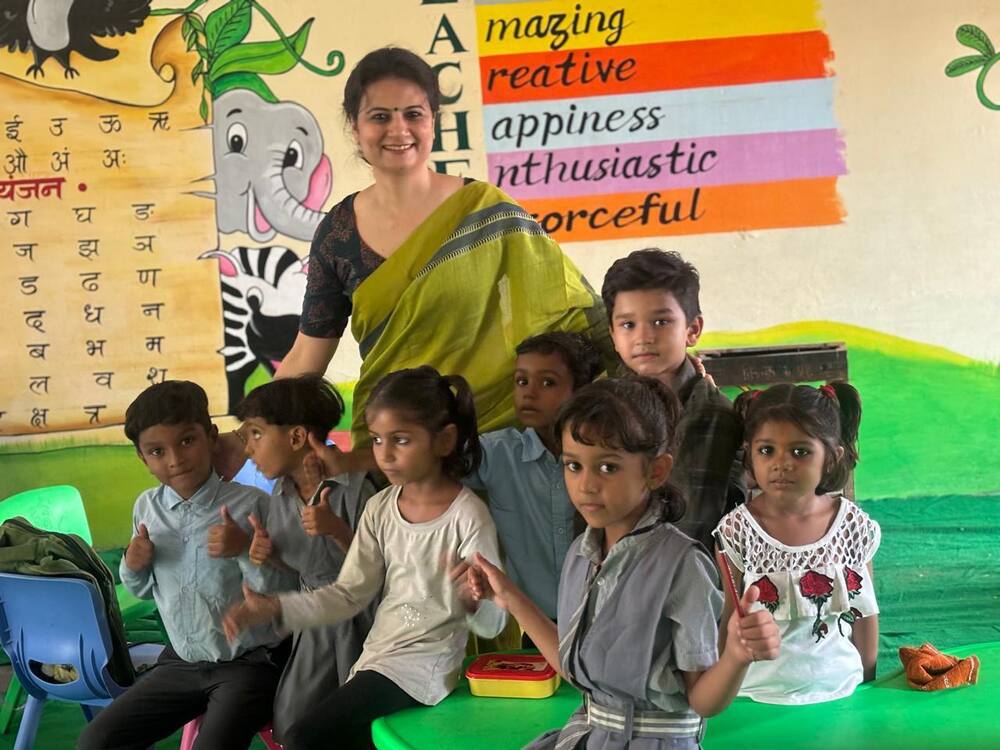 Dr. Shweta Laddha with children in the renovated classroom
