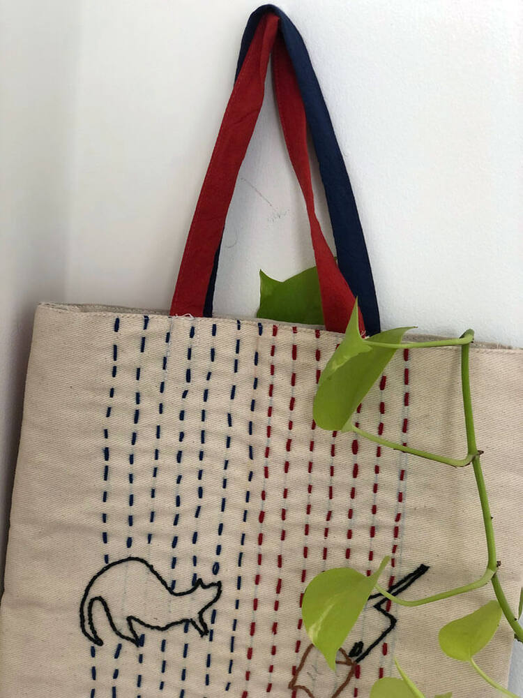 Hand-embroidered kantha-stitch tote bag made by Skill Development Centre trainees