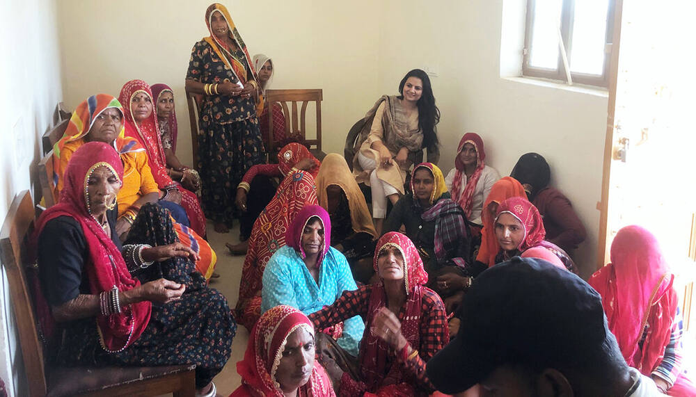Dr. Shweta Laddha with a group of village women at a health meeting, Ralawata