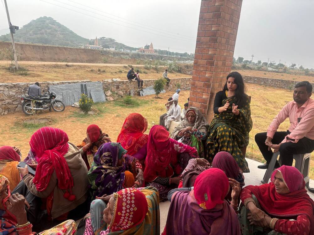 Dr. Shweta Laddha addressing a community health meeting
