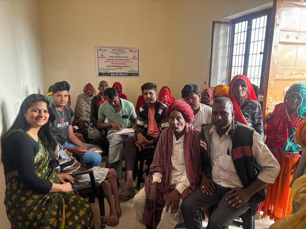 Patients waiting at the Sanjeevani clinic, RITES-WARDS banner