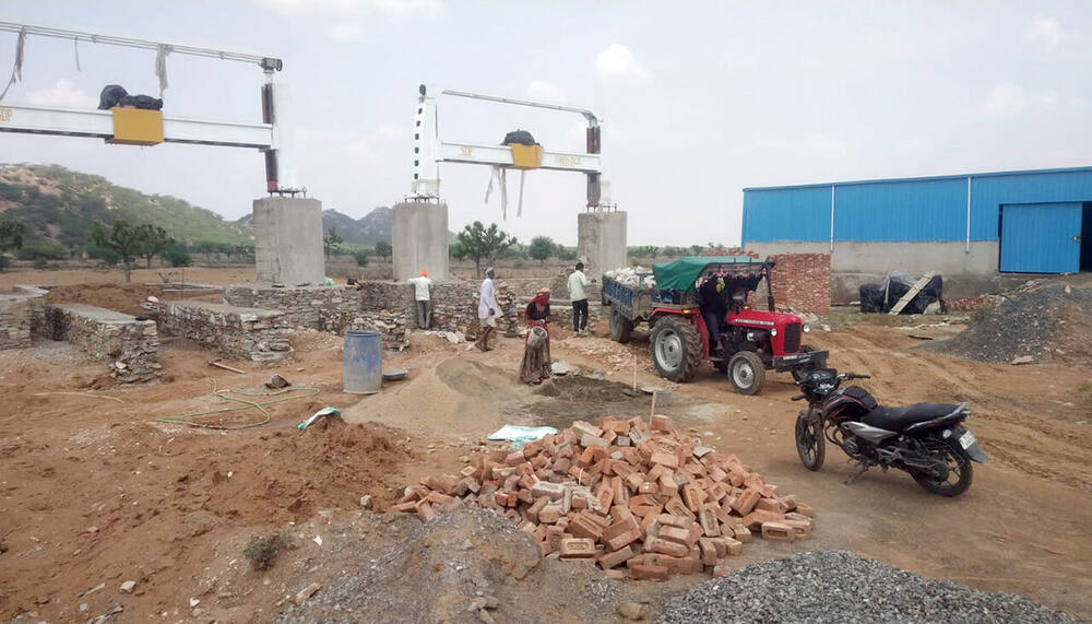 Common Facility Centre construction site, Ralawata, with the stone-cutting gantry track under installation