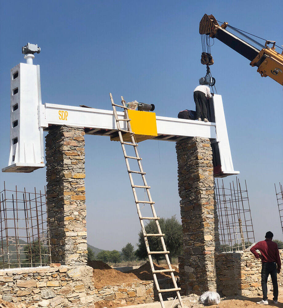 Gantry track frame being assembled onto its stone piers, Ralawata