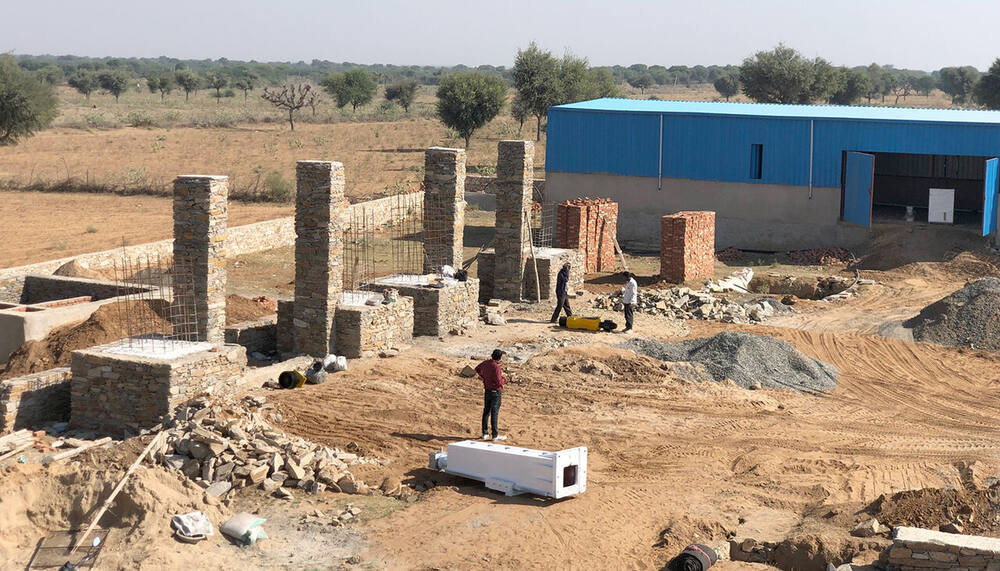 Overhead view of the stone pillars under construction for the gantry track, Ralawata