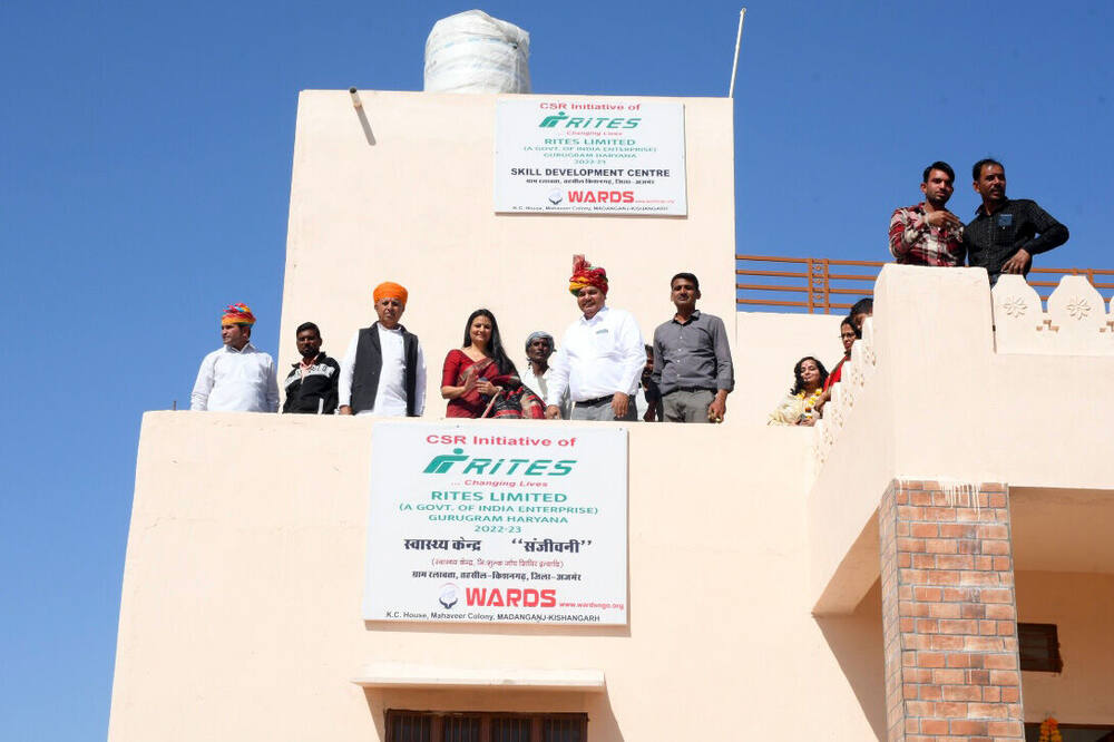 Rooftop view showing both the Skill Development Centre and Sanjeevani signboards on the same building, Ralawata