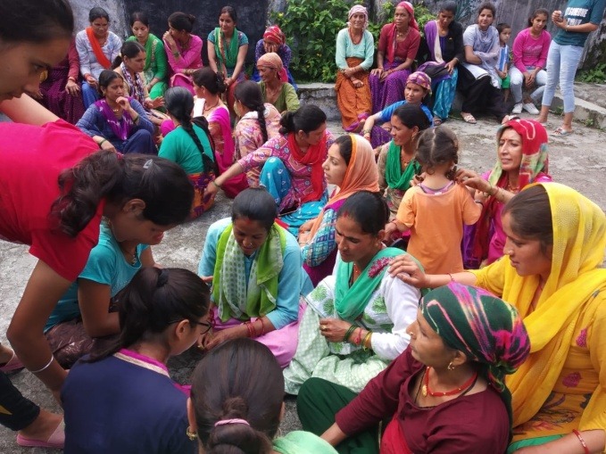 Outdoor community outreach session with women of all ages, Uttarkashi